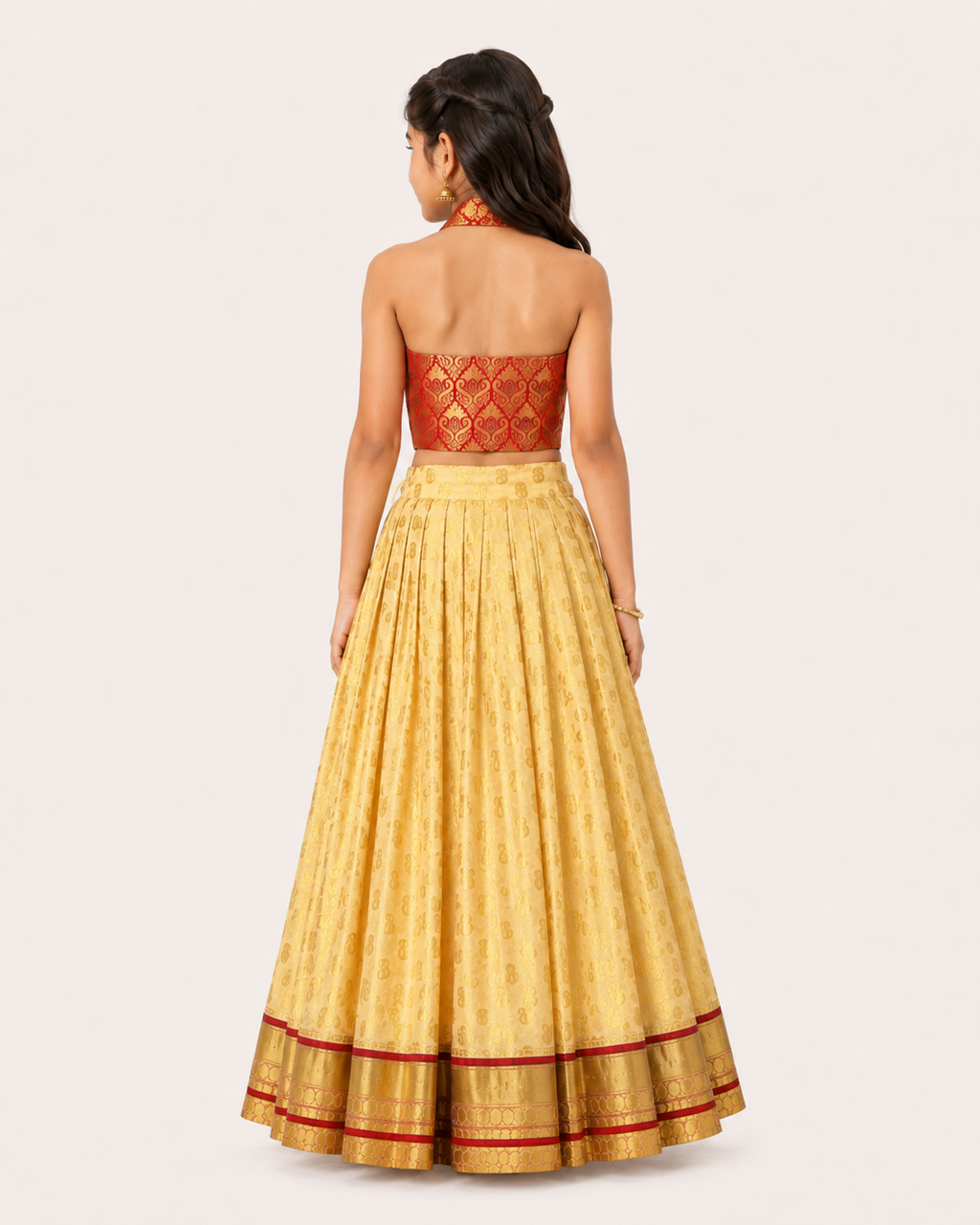 Girl wearing a red brocade blouse with a cream-gold flared lehenga choli set from Lana Fashion Studio