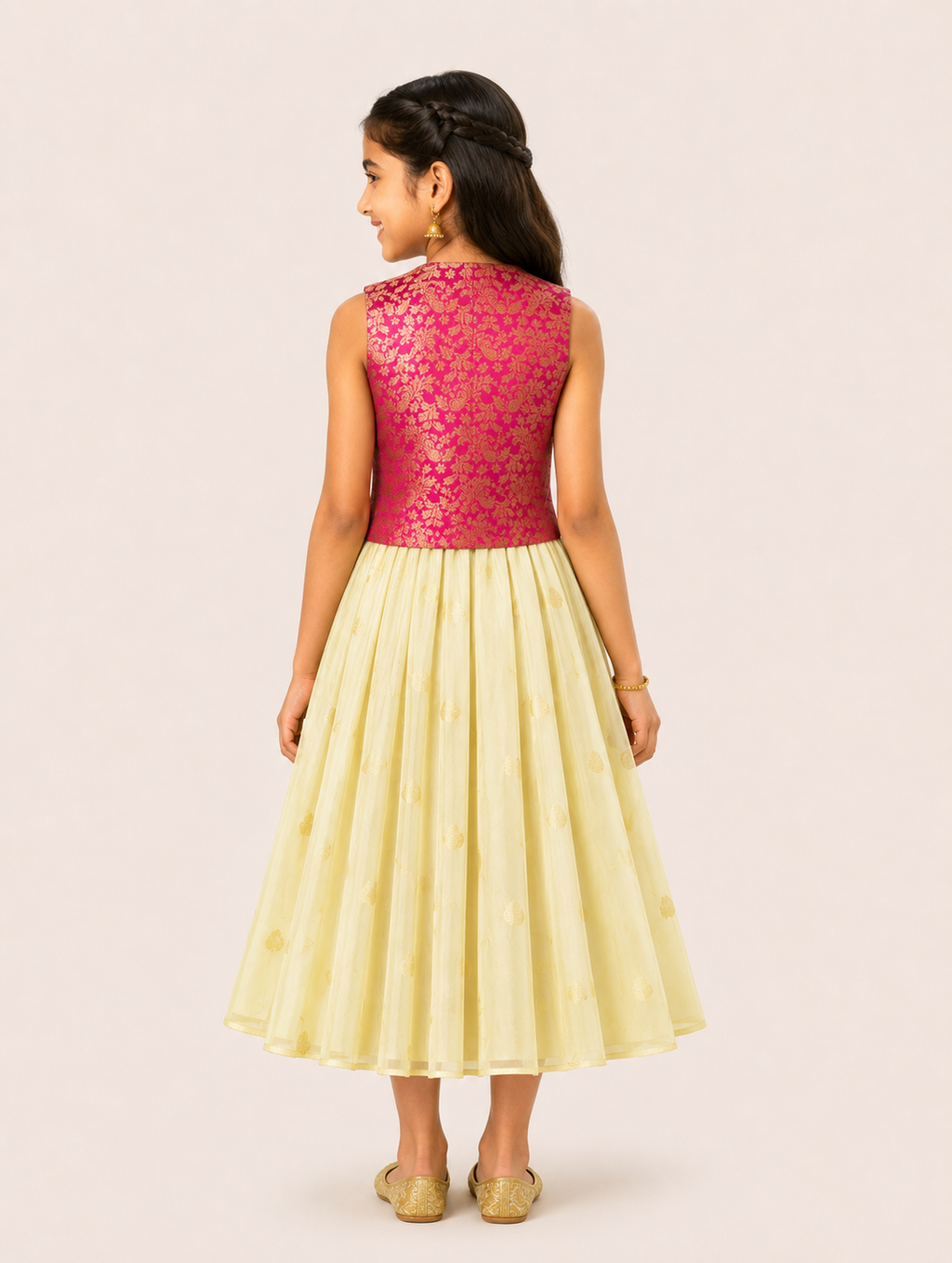 Girl wearing an ivory flared dress with a pink brocade jacket from Lana Fashion Studio